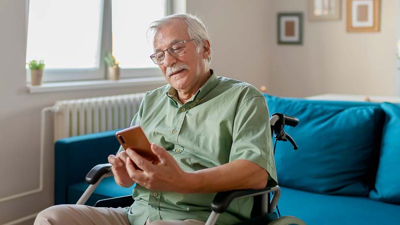 A man looks at his phone.