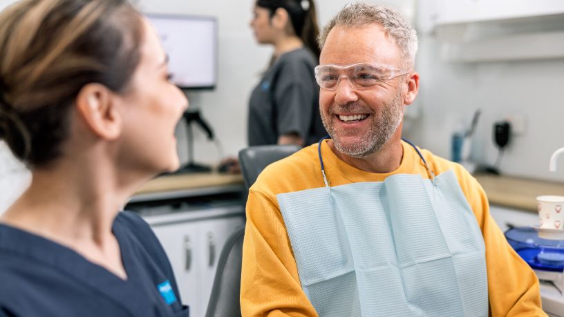 Man smiling at the dentist