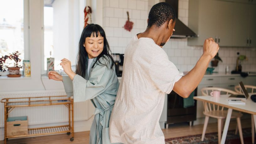 Couple dancing in their kitchen