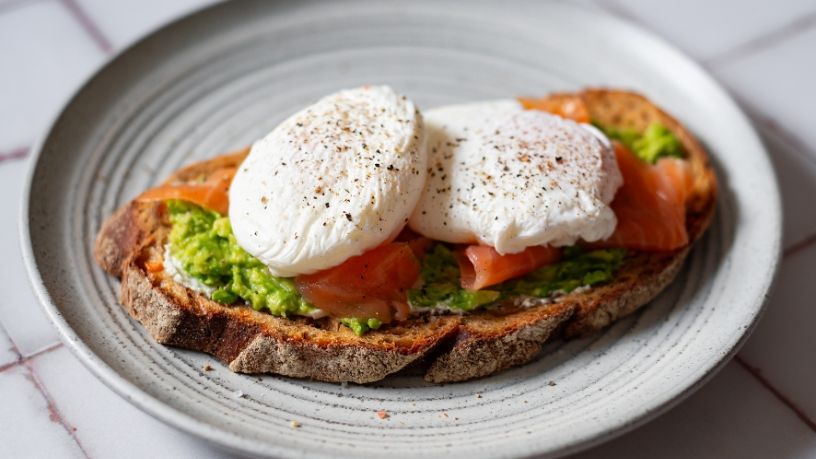 Poached eggs, salmon and avocado on toast